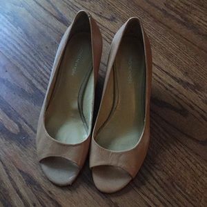 Camel peep toe wedges.